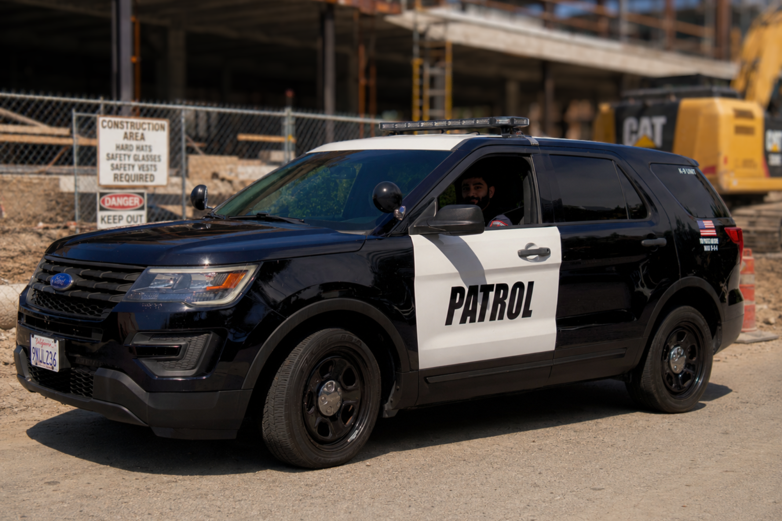 Construction security patrol vehicle providing mobile construction site security for a residential build