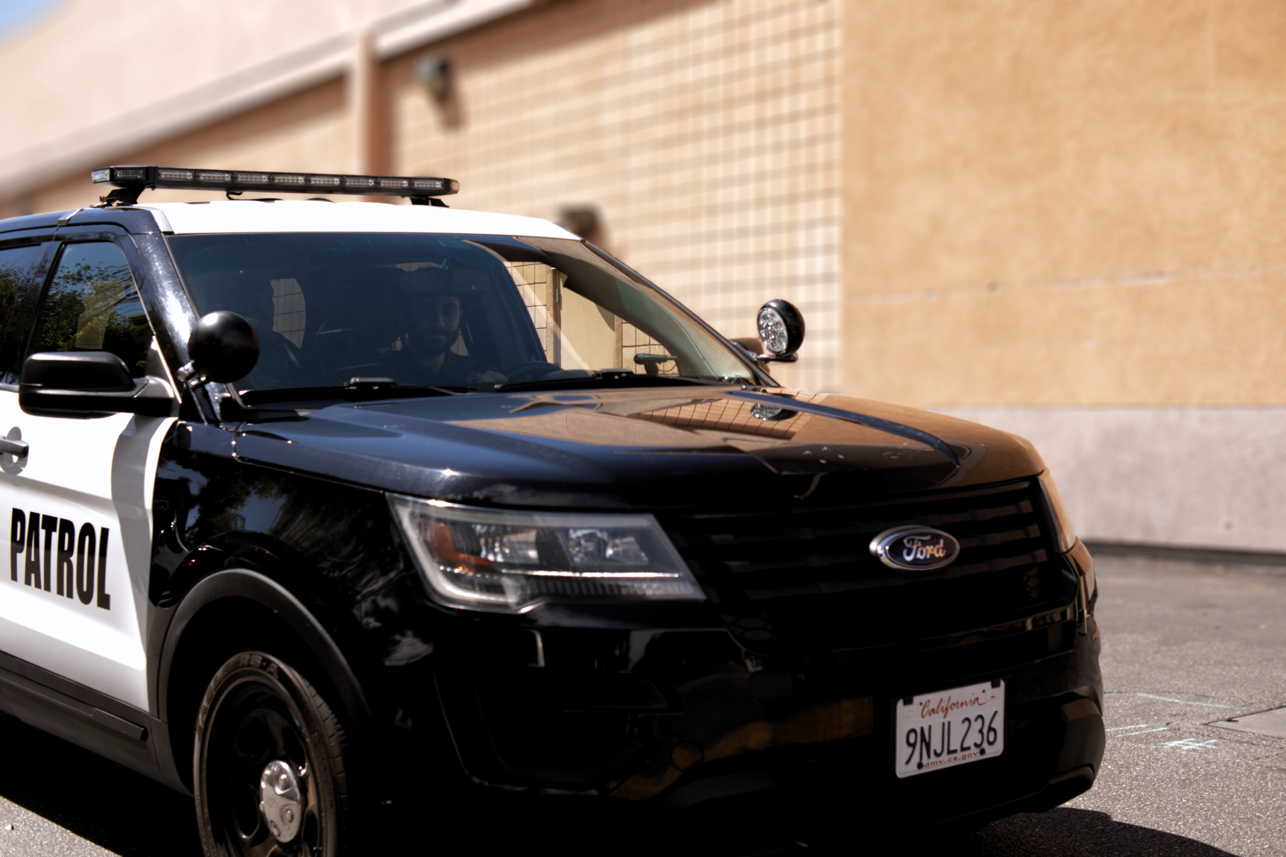 Parking structure security for an apartment resident garage where one car slips in behind another at the gate